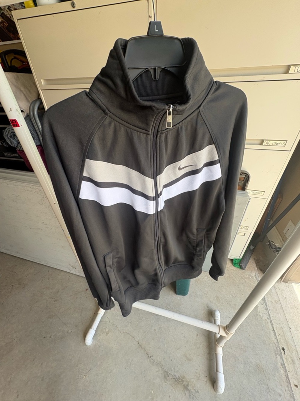 Nike Black Jacket with White and Gray Chevron Stripes